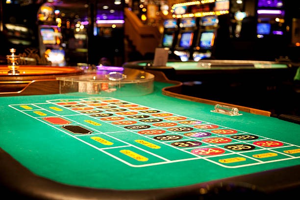 Live dealer studio with table games and camera setup